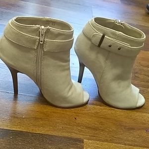 Open toe, high heel, ankle booties.